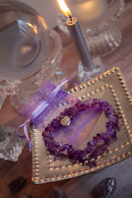 This dainty darling hides  her power. Made from amethyst, the crystal of Peace, she  calms and soothes your mind.  SpacificsbyPatrinaRutherford